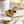 Load image into Gallery viewer, Le Creuset Stainless Steel Measuring Cup 4 Piece Set - Gold
